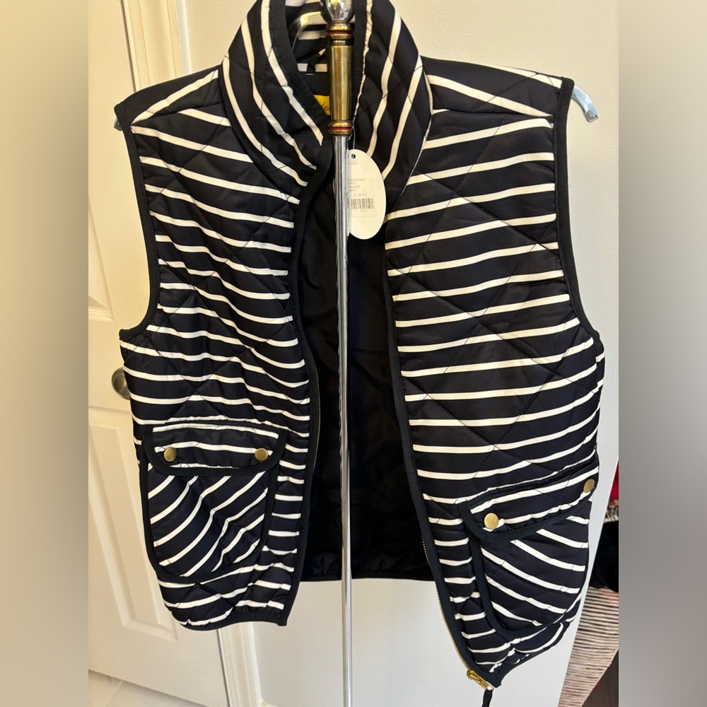 Puff vest, new with tags from boutiques; size small